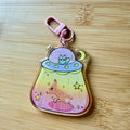 Pastel Alien Cat Abduction Keychain — Orange Tabby & UFO Acrylic Bag Charm